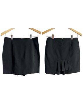 BEBE Black Pleated Ruffle Back Mini Skirt